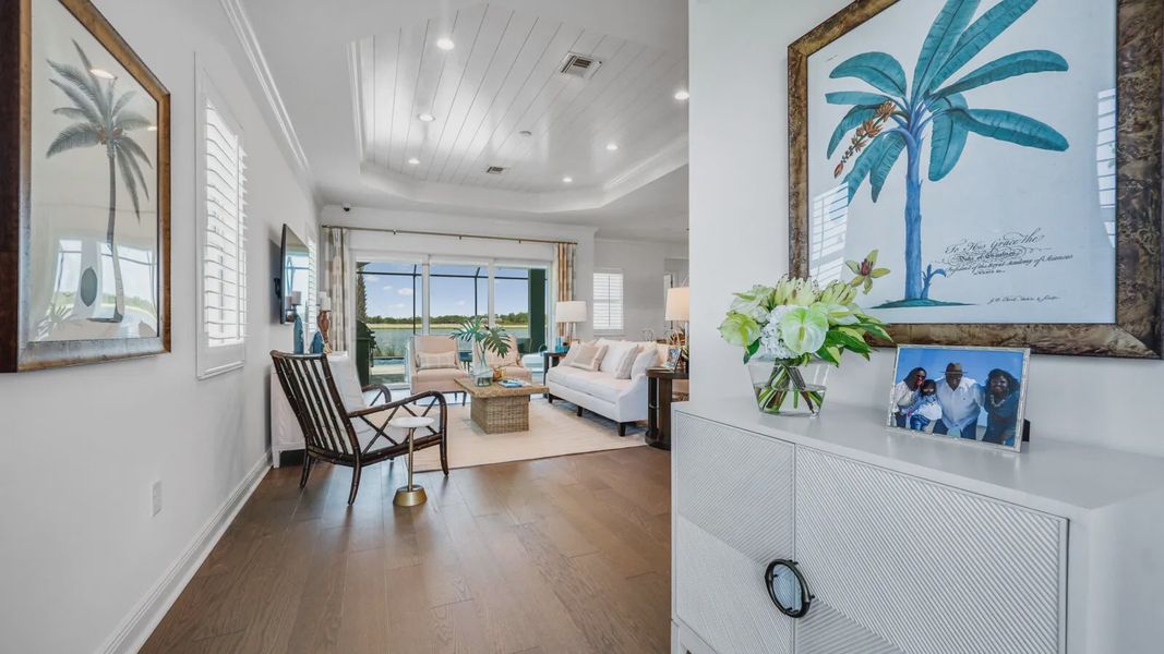 Representative furnished interior of a home built from the Bright Meadow 2 by Neal Communities in SkySail, Naples (Image 11).