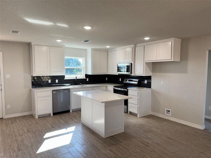 Furnished interior view inside a new home in , Springtown (Image 3).