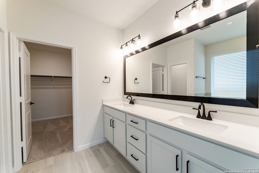 Furnished interior view inside a new home in The Woodlands at Medina Hills, Mico (Image 5).