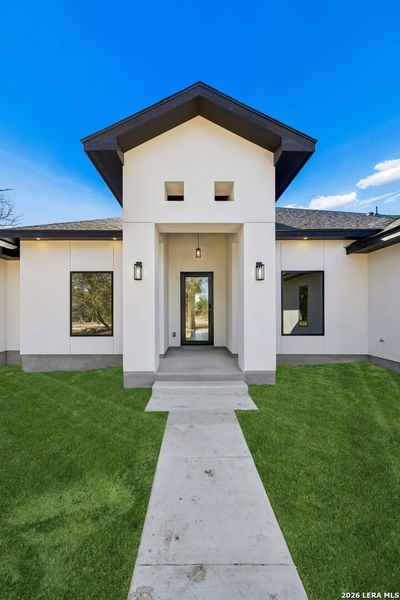 Exterior details and patio area of a home in , Spring Branch (Image 37).