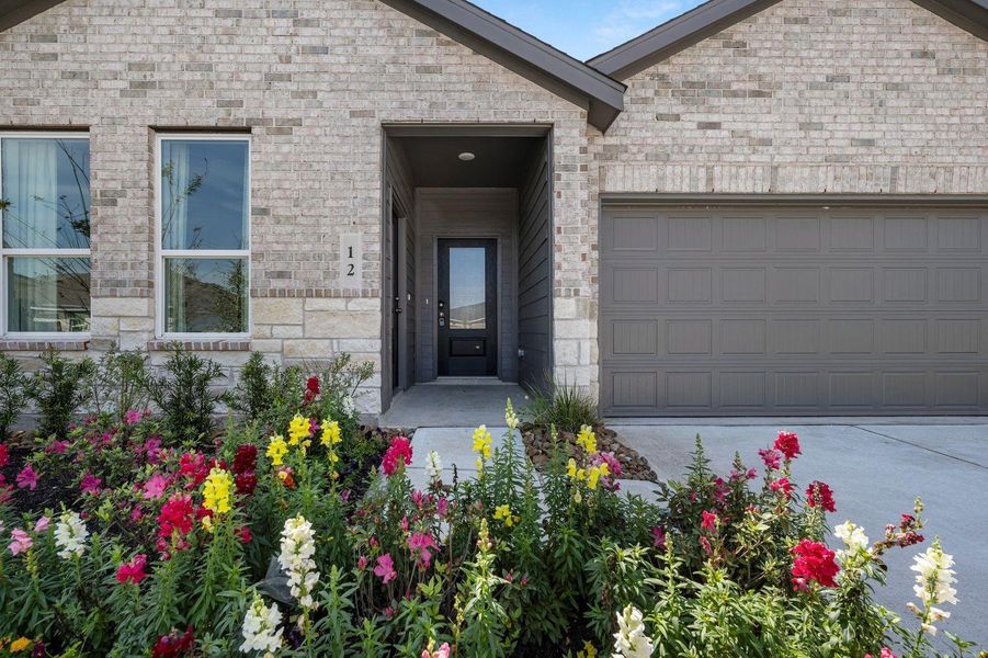 Exterior details and patio area of a home in Riverwood Ranch, Angleton (Image 3).