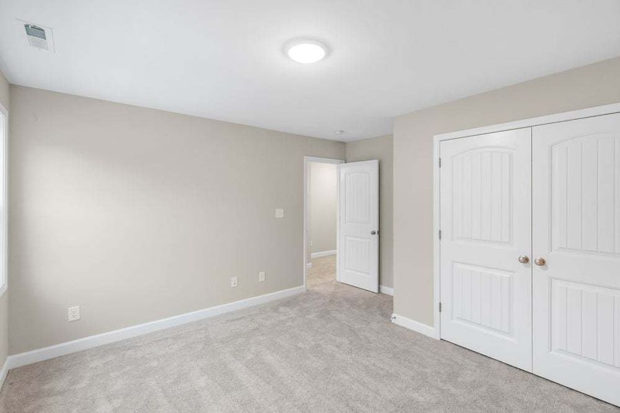 Representative unfurnished interior of a home built from the Aberdeen by Caviness & Cates Communities in Bartlett Manor, Youngsville (Image 83).
