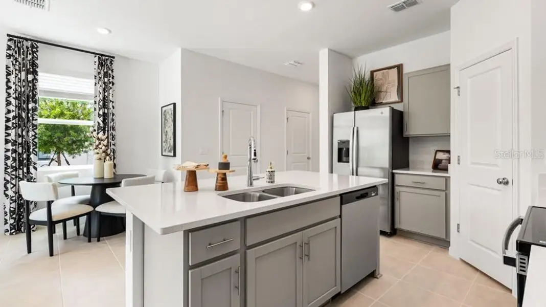 Furnished interior view inside a new home in The Towns at Skye Ranch, Sarasota (Image 15). Furnished interior view inside a new home in The Towns at Skye Ranch, Sarasota (Image 15).