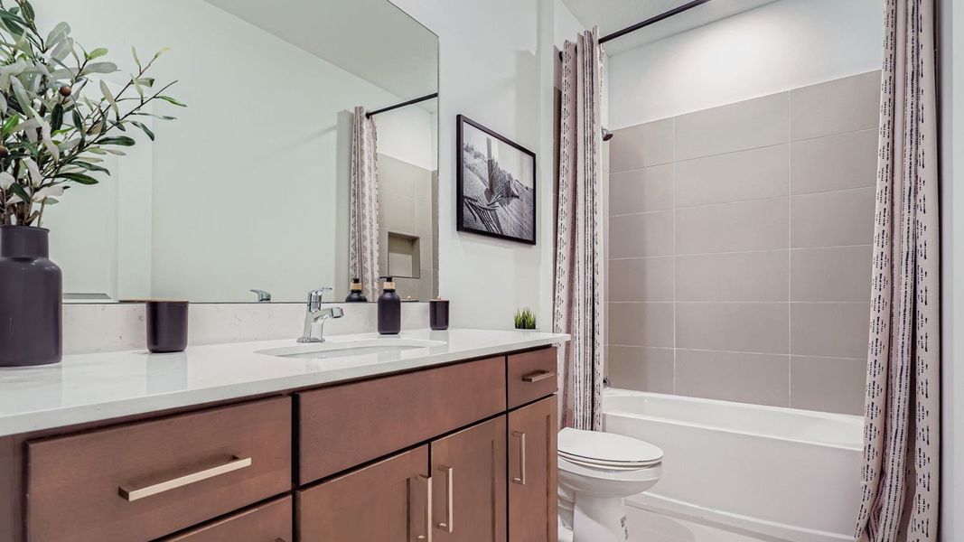 Representative furnished interior of a home built from the Waverly by D.R. Horton in Lakeside Landing, Royal Palm Beach (Image 27).