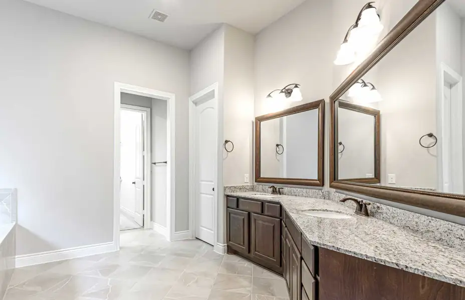 Representative furnished interior of a home built from the 3616 by Ravenna Homes in Artavia 70′, Conroe (Image 12).