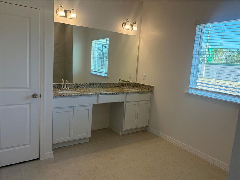 Furnished interior view inside a new home in Heritage Station, Punta Gorda (Image 13).