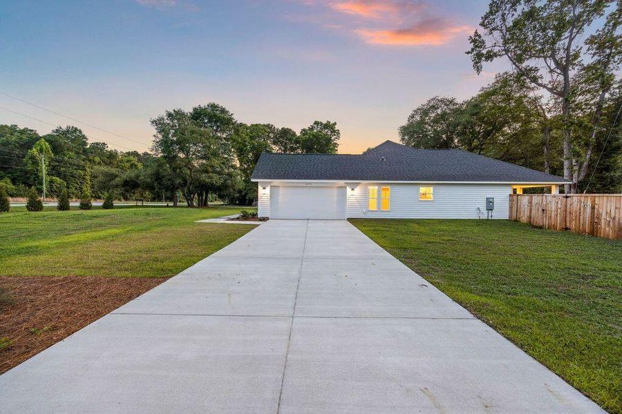 Exterior details and patio area of a home in , Awendaw (Image 30).