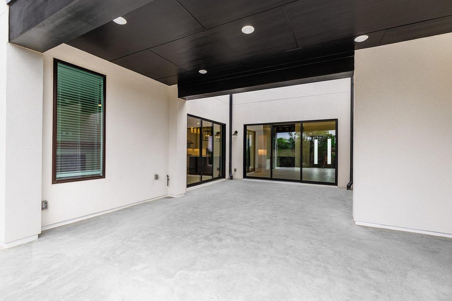 Exterior details and patio area of a home in The Hollows Sanctuary - 85', Jonestown (Image 2).