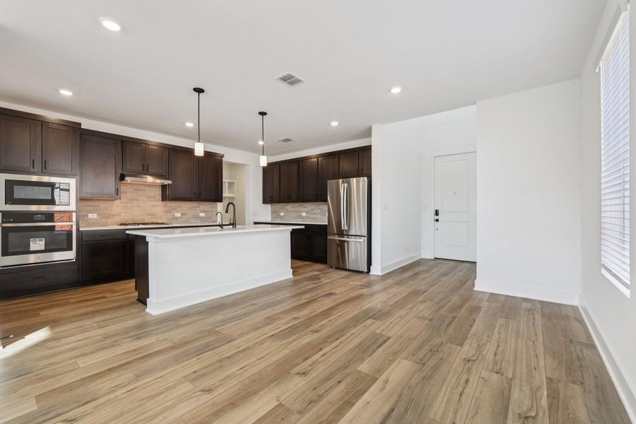 Furnished interior view inside a new home in Lariat, Liberty Hill (Image 5). Furnished interior view inside a new home in Lariat, Liberty Hill (Image 5).