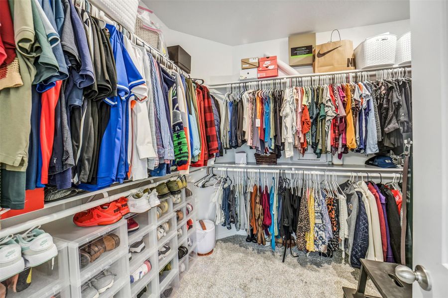 Spacious walk-in primary closet