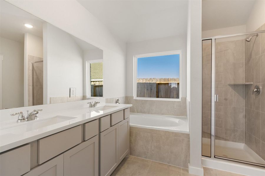 Furnished interior view inside a new home in Sunterra, Katy (Image 8).