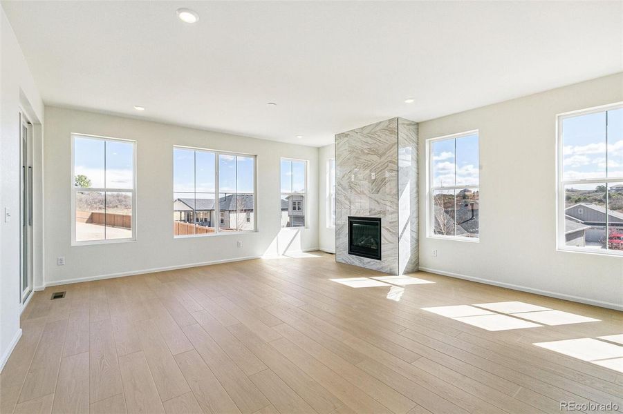 Spacious, unfurnished interior of a new home in Terrain Oak Valley, Castle Rock (Image 38).