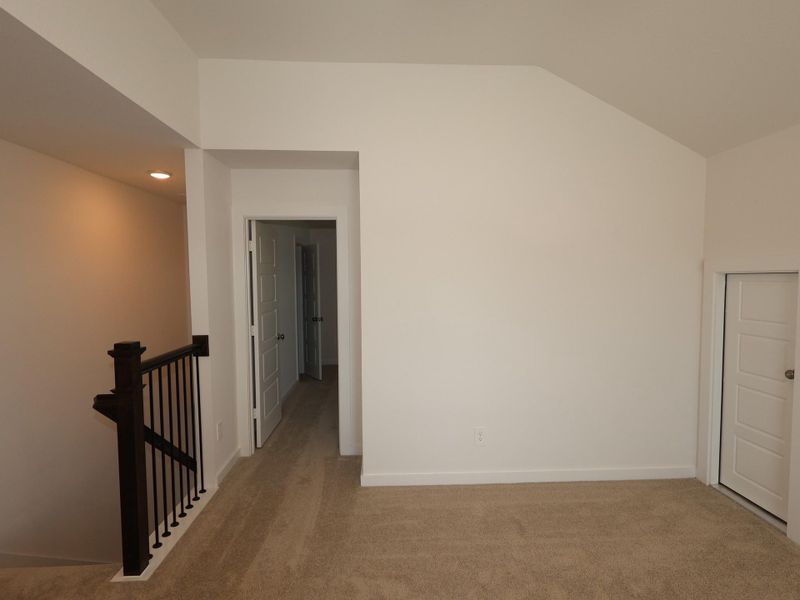 Spacious, unfurnished interior of a new home in Pinewood at Grand Texas, New Caney (Image 18).