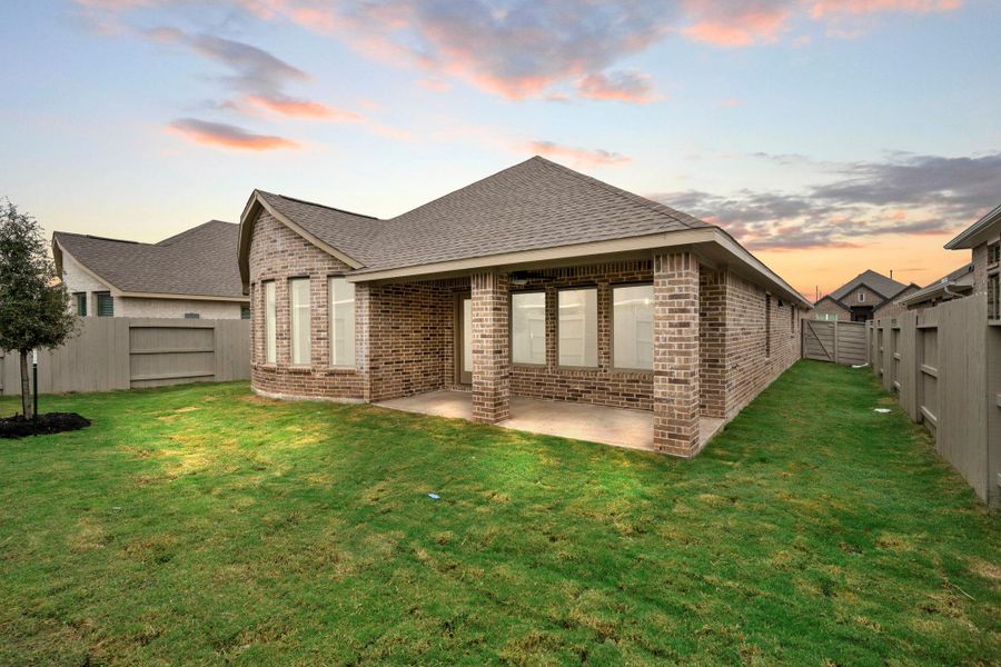 Exterior details and patio area of a home in Pomona 50' & 55', Manvel (Image 4).