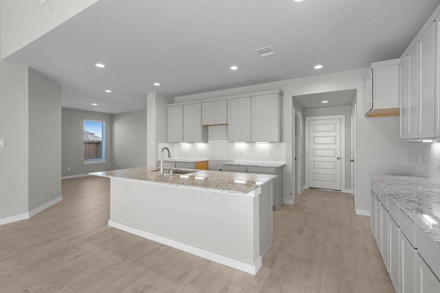 Furnished interior view inside a new home in Sunterra Lakes, Brookshire (Image 15).