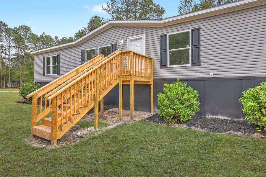 Exterior details and patio area of a home in , Ridgeville (Image 26).
