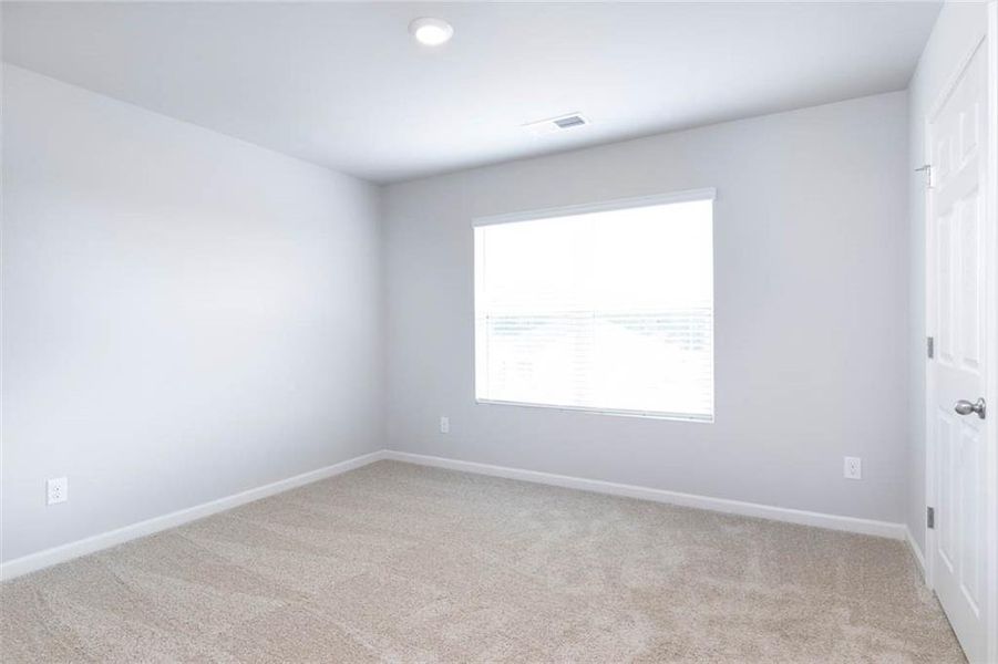 Spacious, unfurnished interior of a new home in The Reserve at Calcutta, Stockbridge (Image 28).