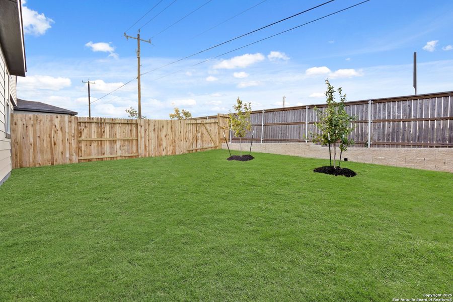Exterior details and patio area of a home in Katzer Ranch, Converse (Image 17).