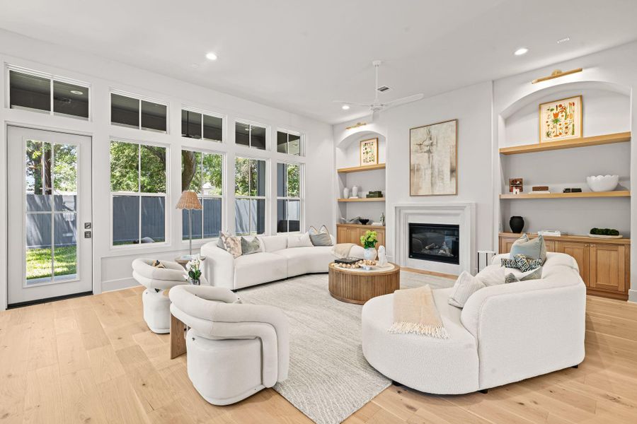 Large living room with access to back patio Large living room with access to back patio