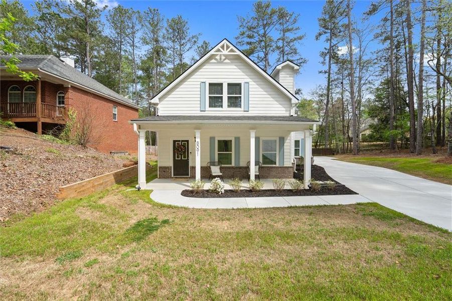 Front exterior of a new home in Fairfield Plantation, Villa Rica, GA, highlighting curb appeal (Image 27).