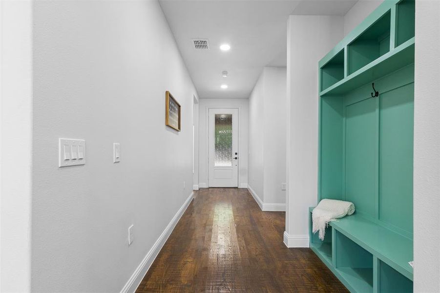 Mudroom with dark wood-style flooring and recessed lighting Mudroom with dark wood-style flooring and recessed lighting