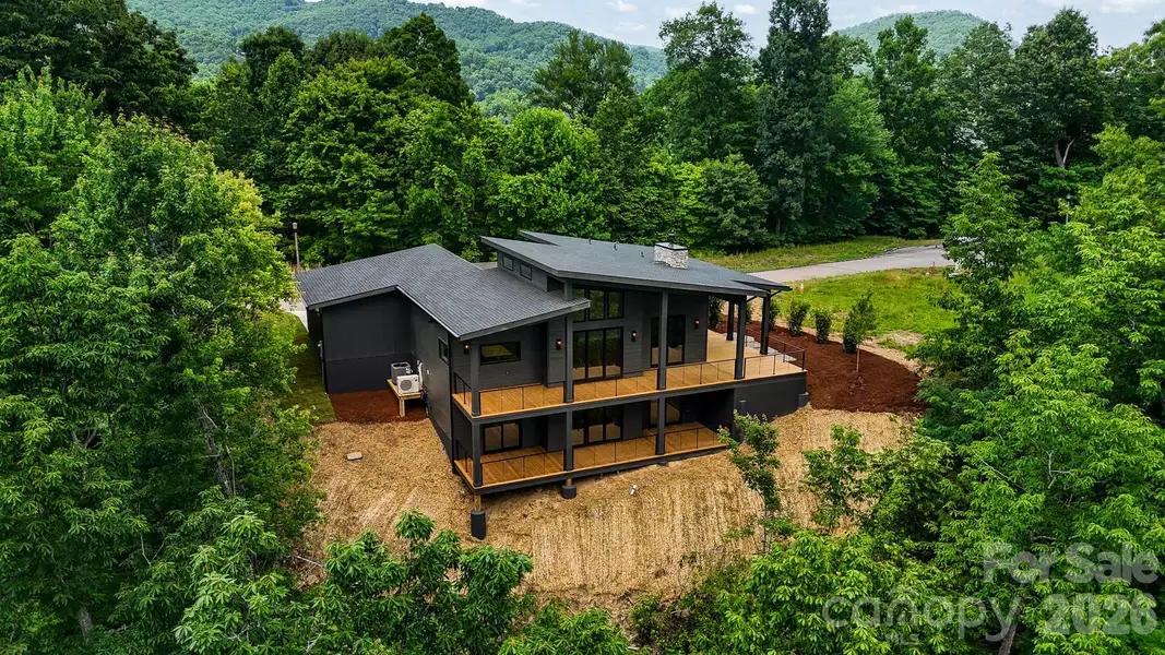 Exterior details and patio area of a home in , Waynesville (Image 25).
