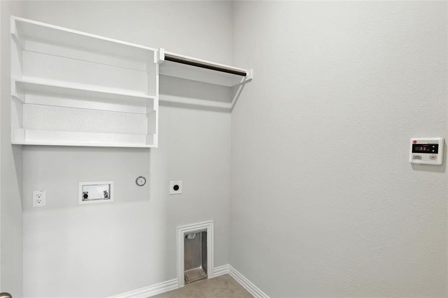 Laundry area featuring washer hookup, hookup for an electric dryer, and hookup for a gas dryer