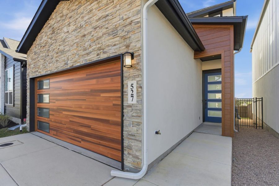 Exterior details and patio area of a home in Centero at Stone Oak, San Antonio (Image 4).