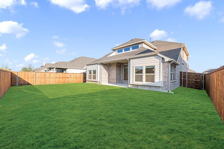 Exterior details and patio area of a home in Woodstone, Providence Village (Image 23). Exterior details and patio area of a home in Woodstone, Providence Village (Image 23).