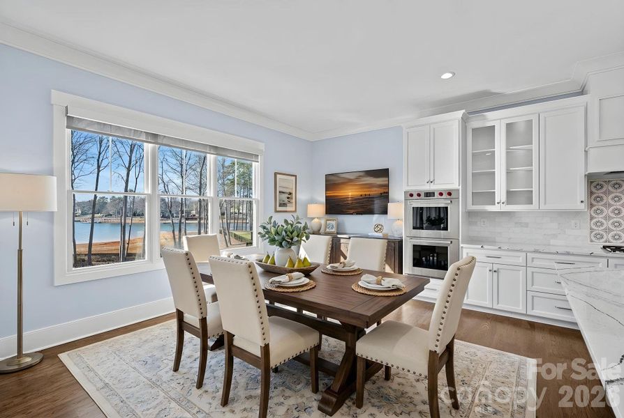 Virtually staged breakfast room Virtually staged breakfast room