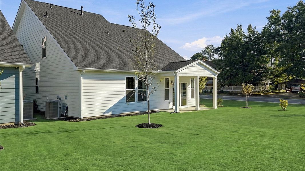 Elegant exterior with a rear covered porch—perfect for relaxing or entertaining outdoors at Barton Hollow Elegant exterior with a rear covered porch—perfect for relaxing or entertaining outdoors at Barton Hollow