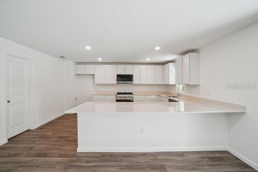 Furnished interior view inside a new home in Royal Highlands, Weeki Wachee (Image 7).