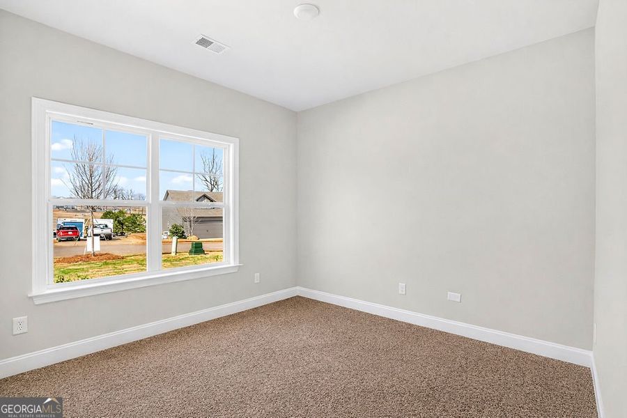 Spacious, unfurnished interior of a new home in Stone Brooke, Gray (Image 12).