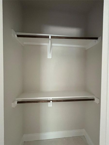 Secondary bedroom closet Secondary bedroom closet