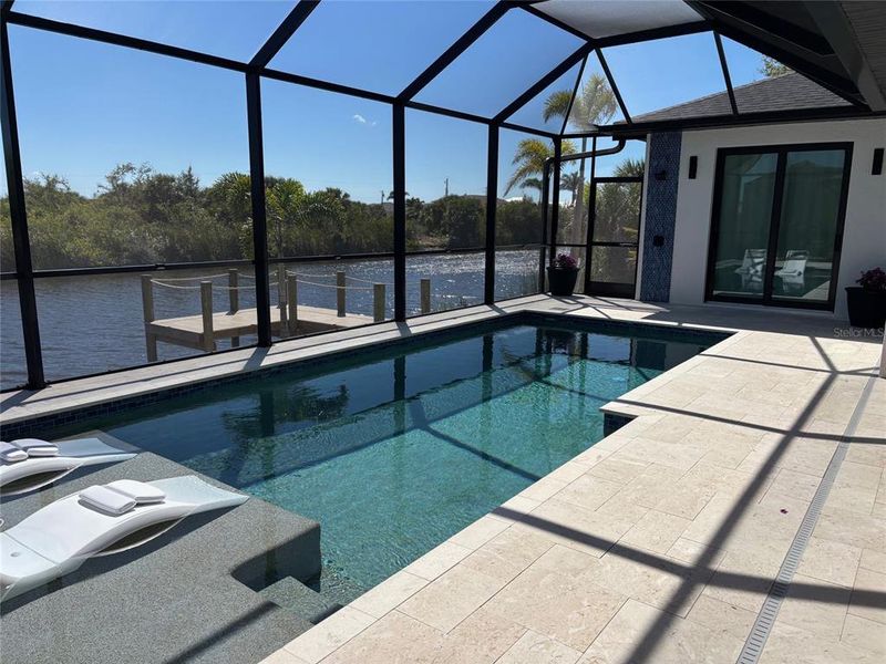 Exterior details and patio area of a home in , Port Charlotte (Image 2). Exterior details and patio area of a home in , Port Charlotte (Image 2).