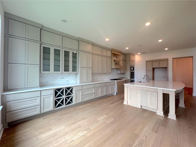 Cabinets galore with wine nook in the hutch