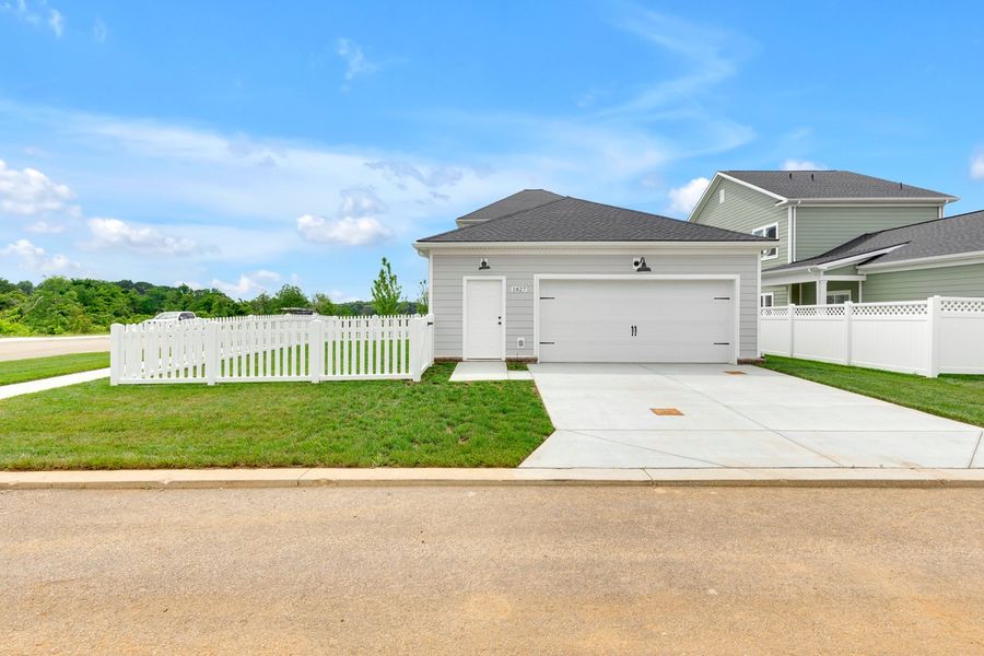 Representative exterior photo of a completed home built from the Titusville II by Regent Homes in Marlon's Creek, Spring Hill, TN (Image 20).