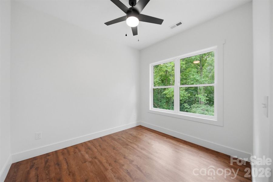 Spacious, unfurnished interior of a new home in , Lenoir (Image 28).