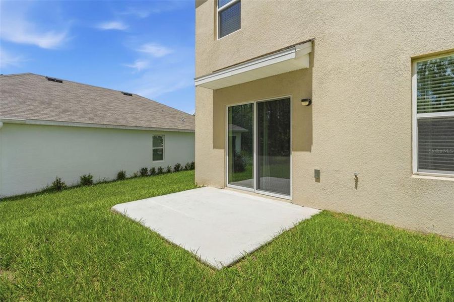 Exterior details and patio area of a home in Lake Diamond, Ocala (Image 30).