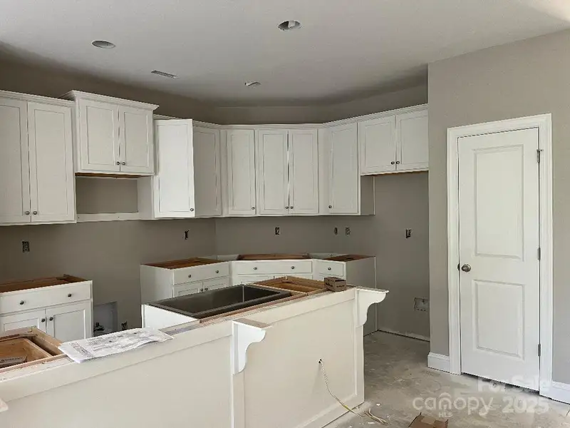 Furnished interior view inside a new home in , Huntersville (Image 1).