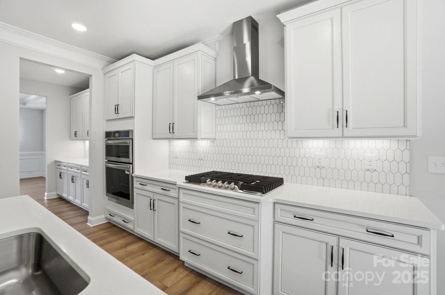 White cabinets and quartz countertops