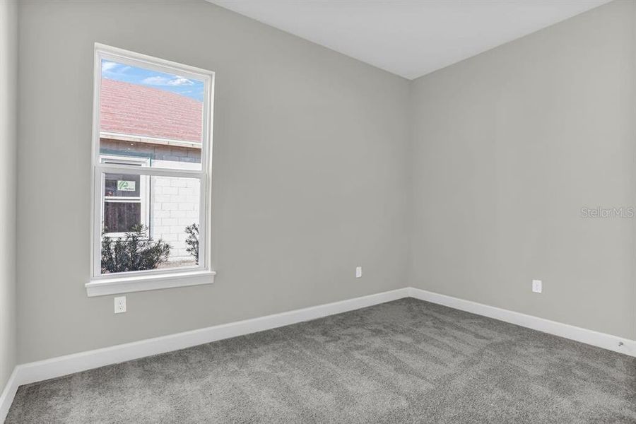 Spacious, unfurnished interior of a new home in Esplanade at Center Lake Ranch, St. Cloud (Image 13).