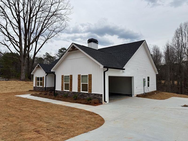 Front exterior of a new home in , Eastanollee, GA, highlighting curb appeal (Image 14). Front exterior of a new home in , Eastanollee, GA, highlighting curb appeal (Image 14).