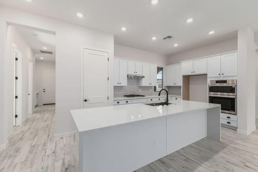 Furnished interior view inside a new home in Valencia at Granite Vista, Waddell (Image 6).