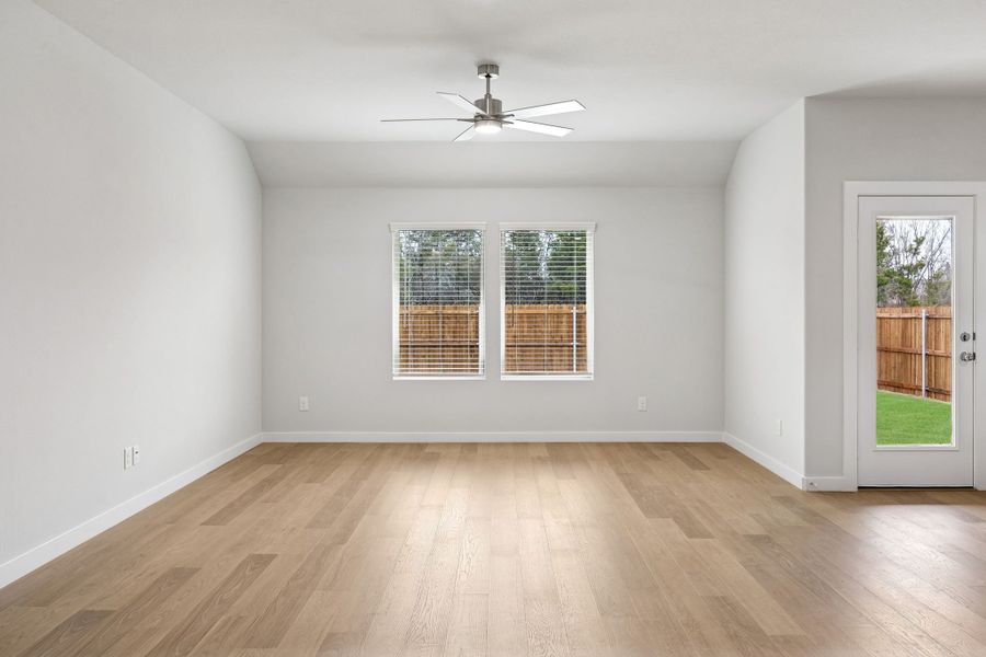 Living Room in the Heisman home plan by Trophy Signature Homes – REPRESENTATIVE PHOTO