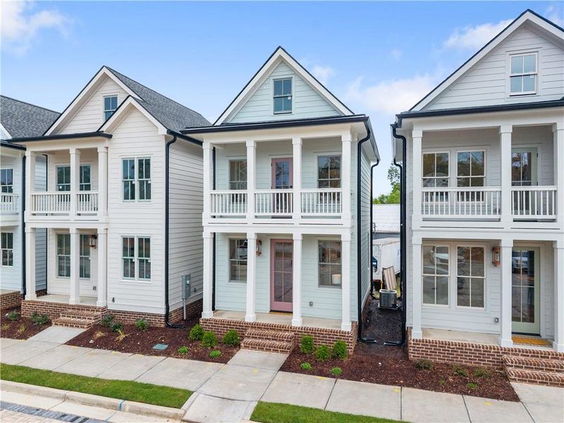 Front exterior of a new home in , Gainesville, GA, highlighting curb appeal (Image 21).