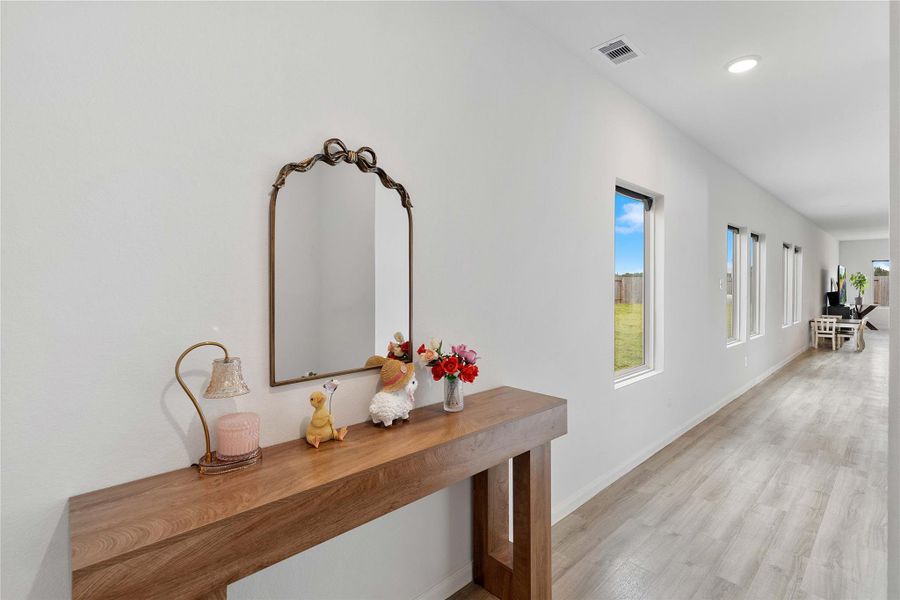Furnished interior view inside a new home in Sweetgrass Village, Crosby (Image 6).