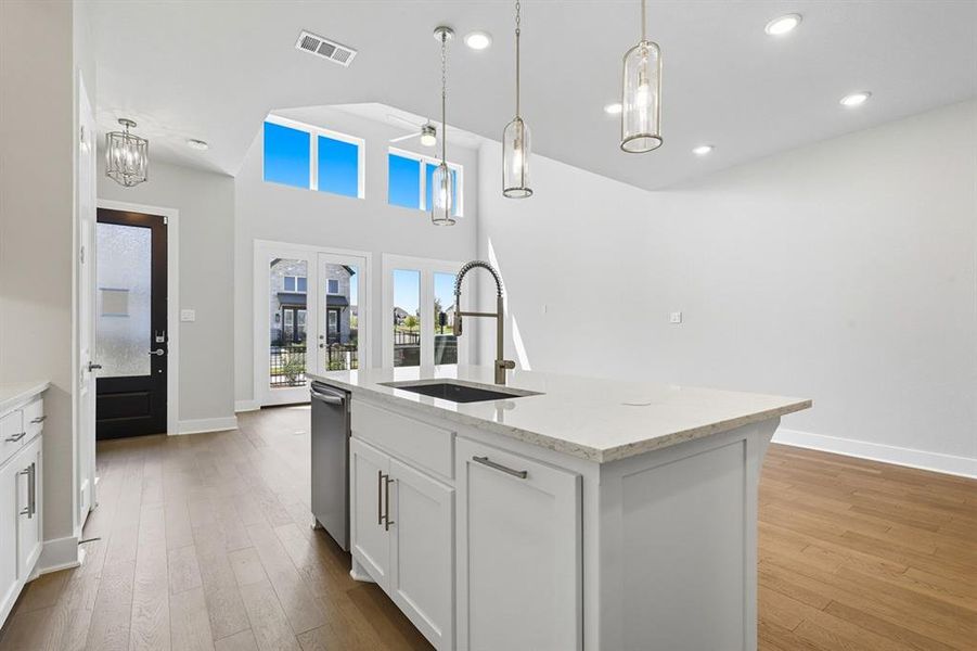 Furnished interior view inside a new home in Walsh: Townhomes - The Patios, Aledo (Image 10). Furnished interior view inside a new home in Walsh: Townhomes - The Patios, Aledo (Image 10).
