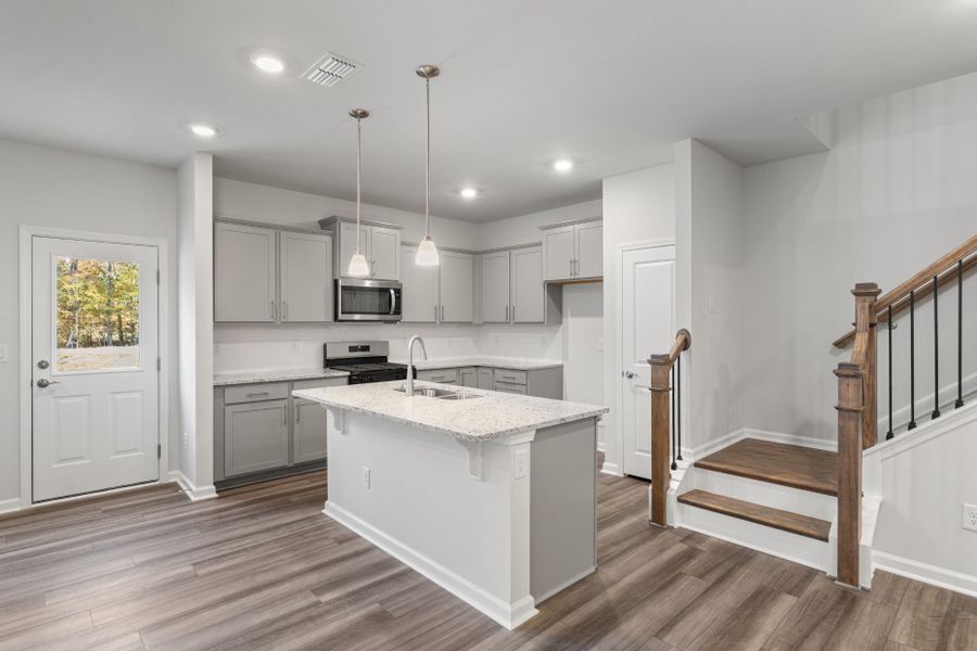 Furnished interior view inside a new home in Poets Walk, Whitsett (Image 11).