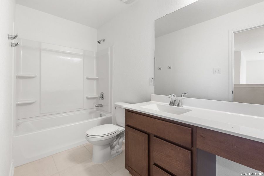 Furnished interior view inside a new home in Southton Cove, Elmendorf (Image 7). Furnished interior view inside a new home in Southton Cove, Elmendorf (Image 7).